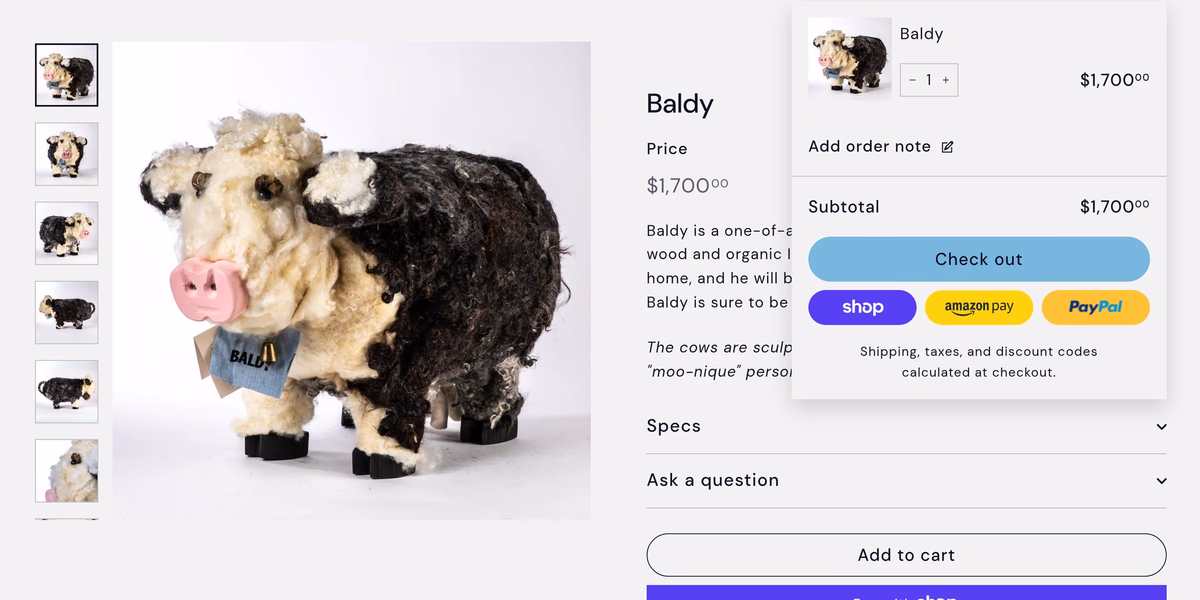 Baldy, a felted cow stool, is added to the cart and the cart drawer opens with the subtotal and a Check out button